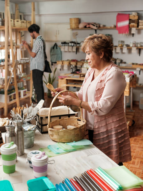 istock Hispanic everyday people looking around in sustainable shop 1226500600