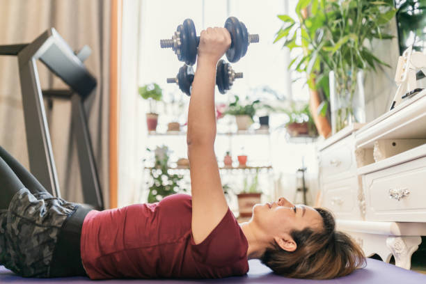 istock Woman do exercising at home 1226512007