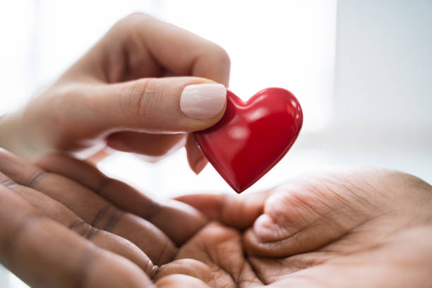 istock Woman Giving Heart On Man's Hand 1226515458
