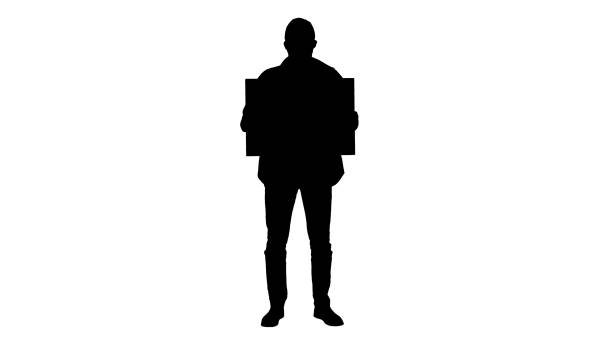 istock Silhouette Young man in casual wear holding copy space board 1226527502