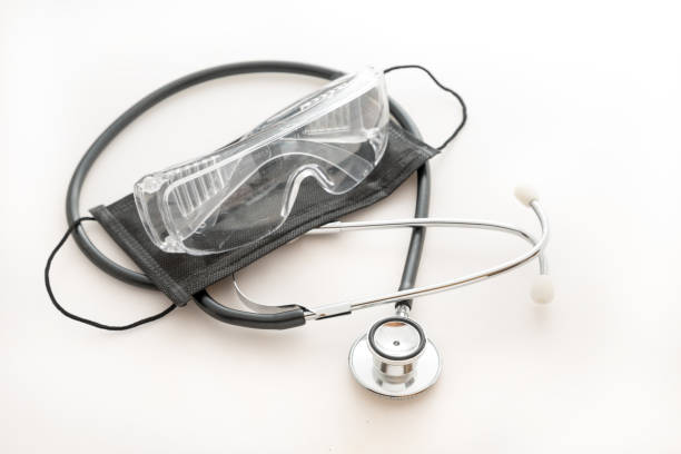 istock Covid-19 mask and glass 1226528319