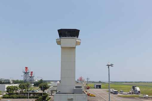 Nankoku, Japan - July 19, 2016 : Air traffic control tower at Kochi Ryoma Airport in Nankoku, Kochi Prefecture, Japan. Kochi Ryoma Airport offers daily scheduled non-stop flights to/from 4 main cities in Japan: Tokyo, Osaka, Nagoya and Fukuoka.