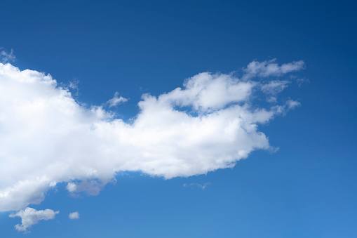 Blue sky with white summer clouds background skyscape