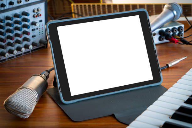 istock Music teleconference with tablet on wood table microphone music stuff 1226545297