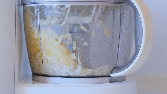 Chopped onions in a food processor. Cooking in a food processor