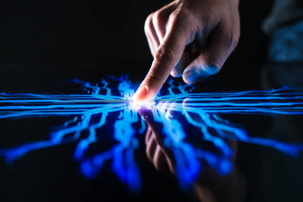 istock Digitalization Concept: Human Finger Pushes Touch Screen Button and Activates Futuristic Artificial Intelligence. Visualization of Machine Learning, AI, Computer Technology Merge with Humanity 1226549719