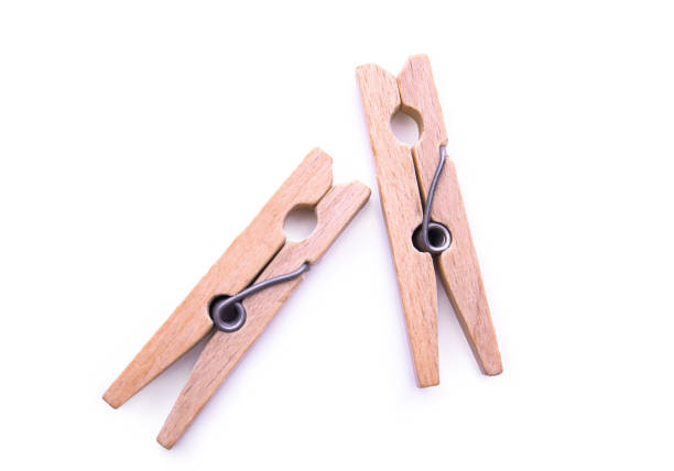 istock Wooden pegs isolated on white background. Zero waste alternative for plastic pins. Eco friendly concept 1226551004