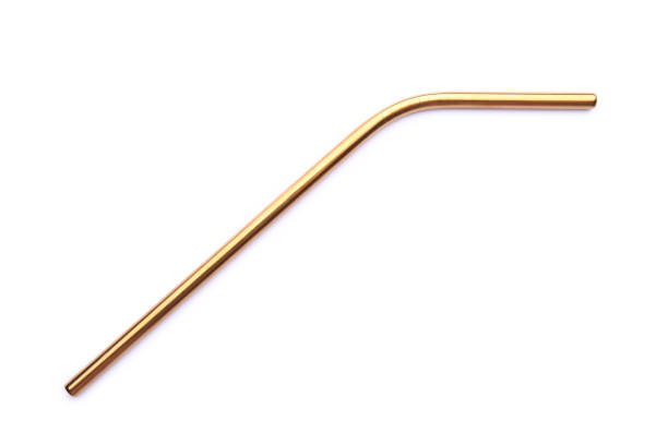 istock Reusable steel straw isolated on white background. Zero waste concept, eco friendly product as alternative to plastic straws. Top view 1226551816