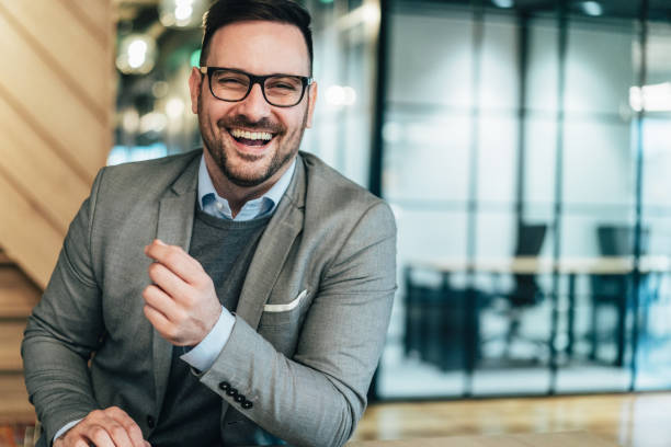 istock Confident and smiling businessman 1226552378