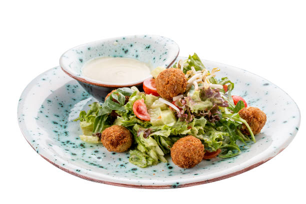 istock Salad with vegetable croquettes and . Vegetarian dish. On white background 1226554475