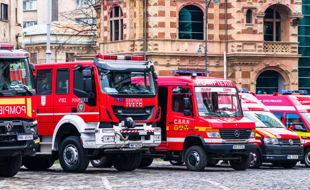 Romanian Firefighting emergency firemen (Pompierii) parked in front of the Home Office (Ministry of the Interior) in Bucharest, Romania, 2020. Coronavirus worldwide outbreak crisis. Spread of the COVID-19 virus