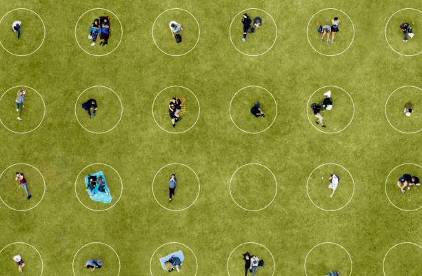 Aerial View of People Social Distancing at the park Aerial View of People Social Distancing at the park conformity photos stock pictures, royalty-free photos & images