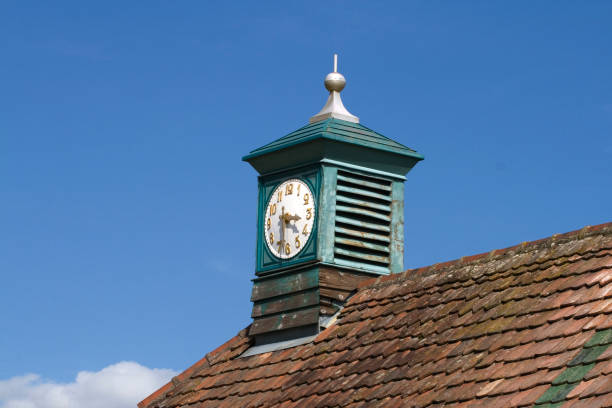 Clock on a roof stock photo