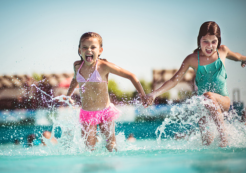 It's always a more fun day with my sister. Children in water.