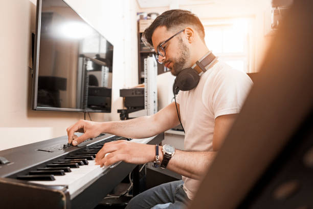 istock Musician playing electric piano 1226562183