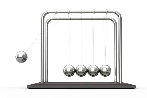 istock Newton's cradle in action on a white background. 3d rendering. 1226562289
