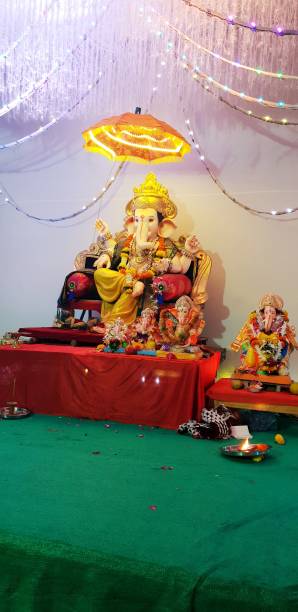 istock beautiful ganesh murti on the table. colourful ganesh Murti. 1226567926