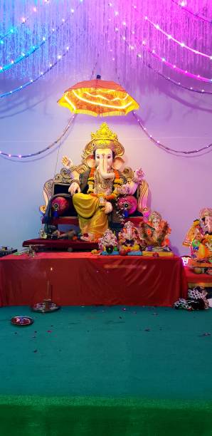 istock beautiful ganesh murti on the table. colourful ganesh Murti. 1226567965