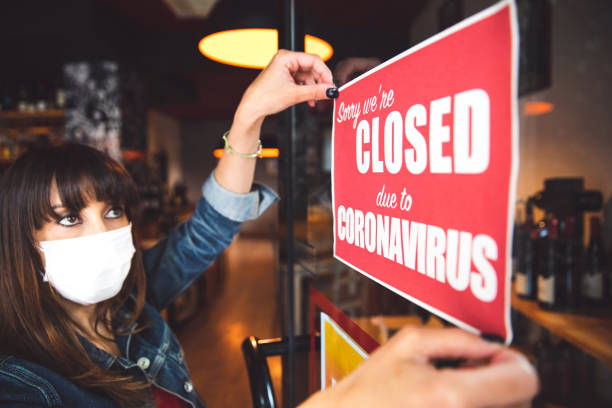 istock Small business closing sign due to Covid-19 coronavirus 1226569733