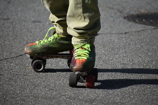Customized roller skates in action at the park on a sunny day