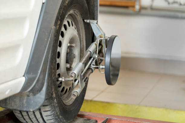 istock Performing wheel alignment works at the service station. 1226570878