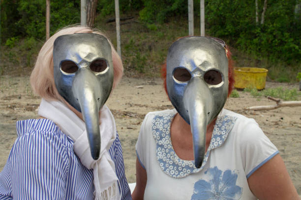 istock Rest on the lake in anti plague masks 1226571925
