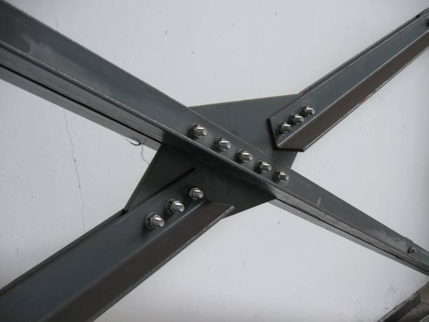istock Steel plate and profiles connected by a screw connection 1226575905