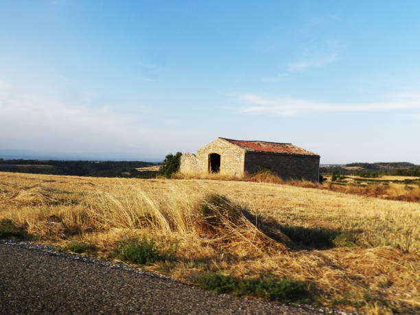 Old ruined country house made of stone, in the middle of nowhere.