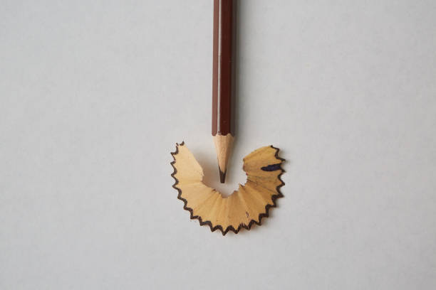 istock A brown colored pencil lies on a white background 1226578246