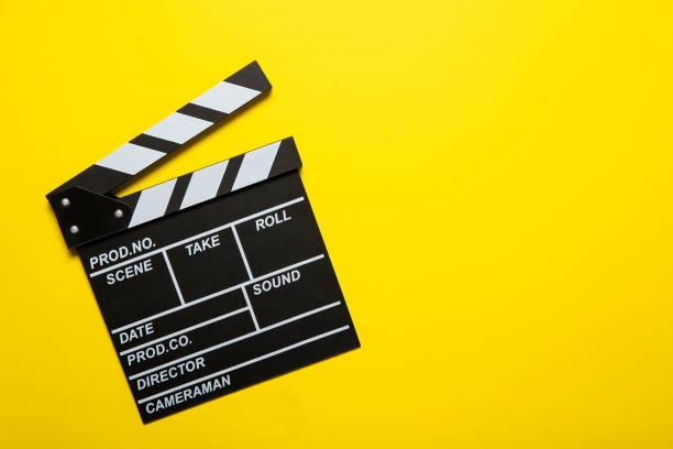 istock Movie clapper on a yellow background, top view. Place for text 1226582634