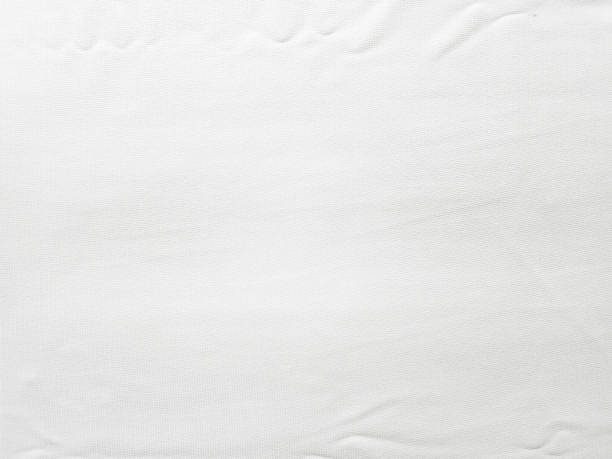 istock Soft white wrinkled fabric background for graphic design 1226583940