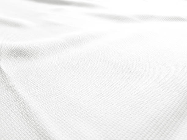 istock Soft white wrinkled fabric background for graphic design 1226585386