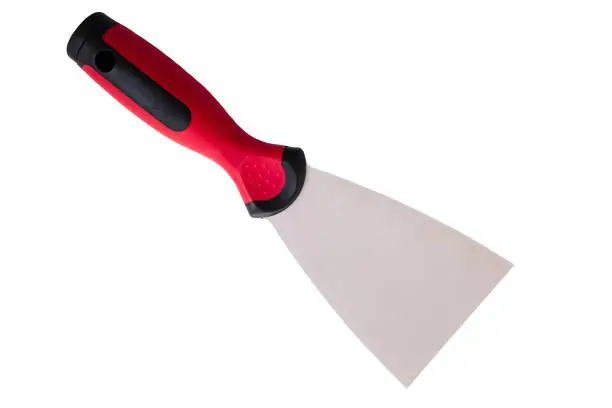 Photo of Steel trowel on a white background