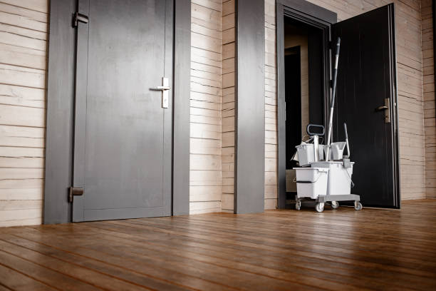 a cleaning bucket at the hotel door stock photo