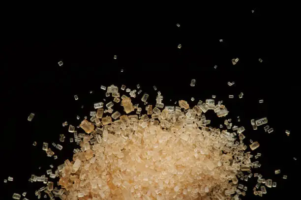 Photo of Brown crystals of natural sugar