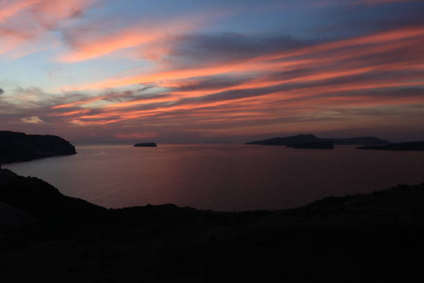 istock Summer sunset in Santorini island in Greece 1226586509