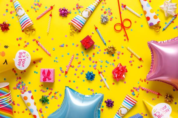 istock flatout Birthday party card on a yellow background with copy space for text 1226586984