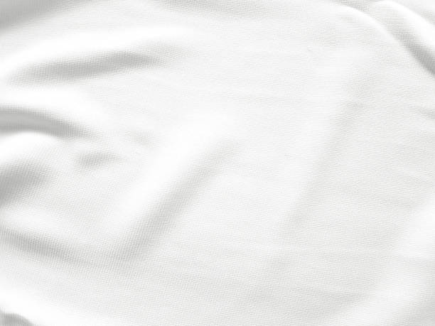 istock Soft white wrinkled fabric background for graphic design 1226586987