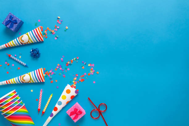 istock flatlay Birthday party card on a blue background with copy space for text 1226587050