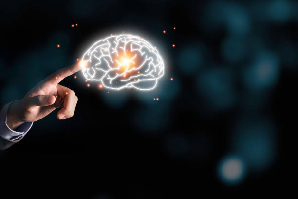 istock Businessman holding the blue virtual brain. Creative new business idea concept. 1226587877