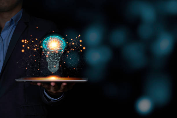 istock The virtual light bulb with brain on tablet. Creative new business idea concept. 1226588074