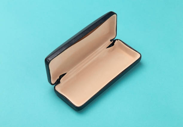 istock Opened Glasses box isolated on light blue background 1226605017
