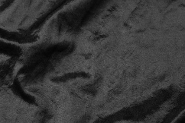 istock Abstract black fabric cloth texture background or liquid wave or wavy folds 1226605572