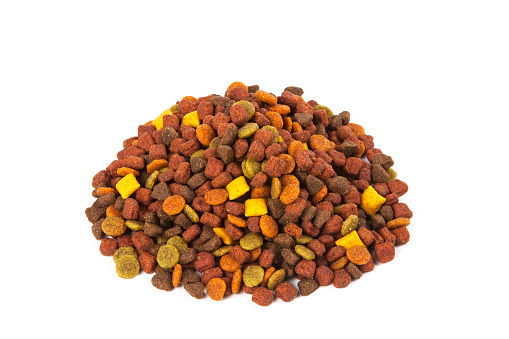 Dry cat food on white background