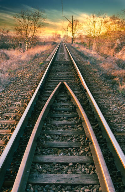 istock Railway line straight to the beautiful sunset 1226608300