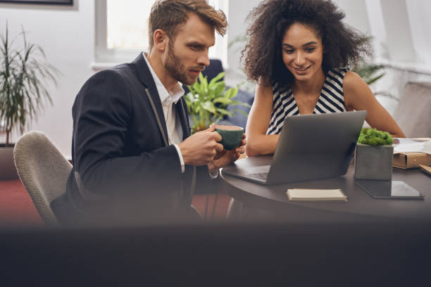 istock Two business people sitting at the desk 1226613845