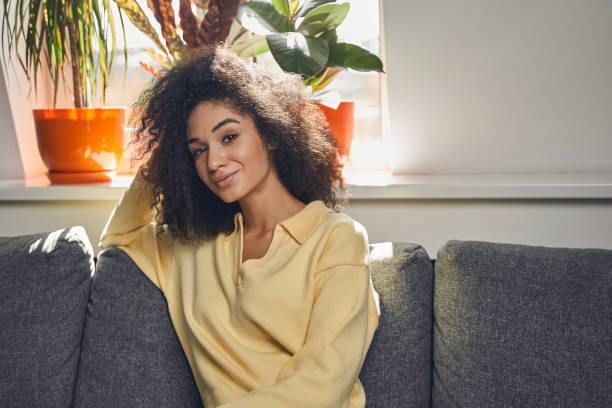 istock Lady in a sweater smiling at the camera 1226613944