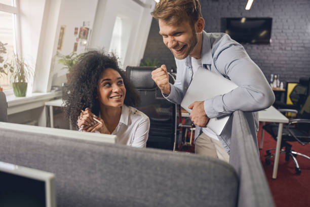 istock Man standing next to a smiling woman 1226614000
