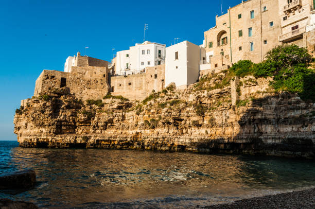 istock Spectacular view on an ancient building on the cliff reflecting in water 1226614684