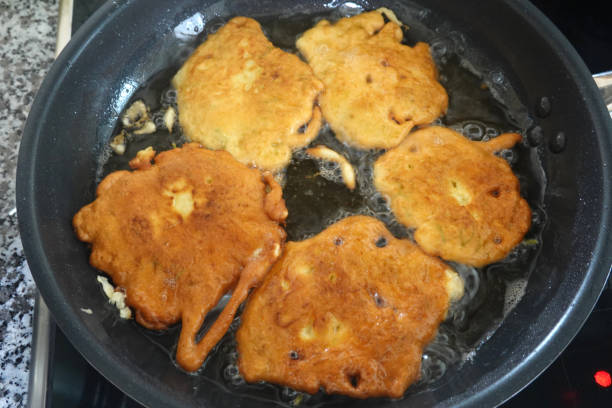 istock Elderflowers in pancake batter getting deep fried in pan 1226616341